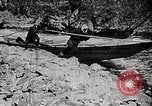 Image of long boats navigate rapids Japan, 1898, second 22 stock footage video 65675024930