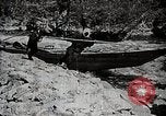Image of long boats navigate rapids Japan, 1898, second 23 stock footage video 65675024930