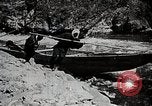 Image of long boats navigate rapids Japan, 1898, second 25 stock footage video 65675024930