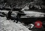 Image of long boats navigate rapids Japan, 1898, second 26 stock footage video 65675024930