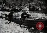 Image of long boats navigate rapids Japan, 1898, second 27 stock footage video 65675024930