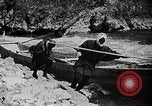 Image of long boats navigate rapids Japan, 1898, second 28 stock footage video 65675024930