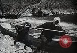 Image of long boats navigate rapids Japan, 1898, second 30 stock footage video 65675024930