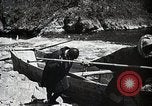 Image of long boats navigate rapids Japan, 1898, second 31 stock footage video 65675024930