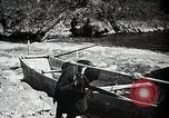 Image of long boats navigate rapids Japan, 1898, second 32 stock footage video 65675024930