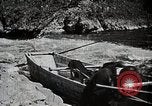 Image of long boats navigate rapids Japan, 1898, second 33 stock footage video 65675024930