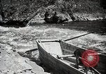 Image of long boats navigate rapids Japan, 1898, second 35 stock footage video 65675024930