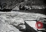 Image of long boats navigate rapids Japan, 1898, second 37 stock footage video 65675024930