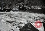 Image of long boats navigate rapids Japan, 1898, second 39 stock footage video 65675024930