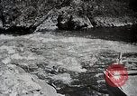 Image of long boats navigate rapids Japan, 1898, second 40 stock footage video 65675024930