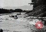 Image of long boats navigate rapids Japan, 1898, second 45 stock footage video 65675024930