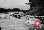 Image of long boats navigate rapids Japan, 1898, second 46 stock footage video 65675024930