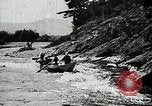Image of long boats navigate rapids Japan, 1898, second 48 stock footage video 65675024930