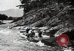 Image of long boats navigate rapids Japan, 1898, second 51 stock footage video 65675024930