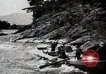 Image of long boats navigate rapids Japan, 1898, second 52 stock footage video 65675024930