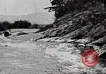 Image of long boats navigate rapids Japan, 1898, second 56 stock footage video 65675024930