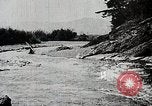 Image of long boats navigate rapids Japan, 1898, second 58 stock footage video 65675024930