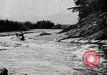 Image of long boats navigate rapids Japan, 1898, second 60 stock footage video 65675024930