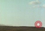 Standbild USA dive Bomber angreifen Okinawa Okinawa, 1945, aus Sekunde 62 historischem Filmmaterial Videoclip 65675024977