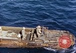 Image of U.S. wounded transported by boat from Okinawa battlefield Pacific Ocean, 1945, second 10 stock footage video 65675024978