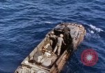 Image of U.S. wounded transported by boat from Okinawa battlefield Pacific Ocean, 1945, second 11 stock footage video 65675024978