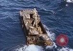 Image of U.S. wounded transported by boat from Okinawa battlefield Pacific Ocean, 1945, second 17 stock footage video 65675024978