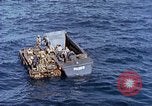 Image of U.S. wounded transported by boat from Okinawa battlefield Pacific Ocean, 1945, second 25 stock footage video 65675024978