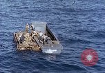 Image of U.S. wounded transported by boat from Okinawa battlefield Pacific Ocean, 1945, second 26 stock footage video 65675024978