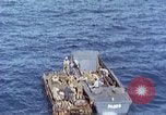 Image of U.S. wounded transported by boat from Okinawa battlefield Pacific Ocean, 1945, second 28 stock footage video 65675024978
