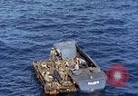 Image of U.S. wounded transported by boat from Okinawa battlefield Pacific Ocean, 1945, second 30 stock footage video 65675024978