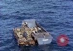 Image of U.S. wounded transported by boat from Okinawa battlefield Pacific Ocean, 1945, second 32 stock footage video 65675024978