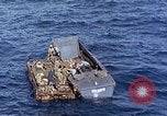 Image of U.S. wounded transported by boat from Okinawa battlefield Pacific Ocean, 1945, second 33 stock footage video 65675024978