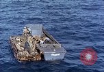 Image of U.S. wounded transported by boat from Okinawa battlefield Pacific Ocean, 1945, second 35 stock footage video 65675024978