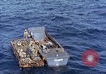 Image of U.S. wounded transported by boat from Okinawa battlefield Pacific Ocean, 1945, second 36 stock footage video 65675024978