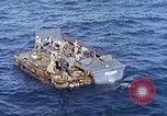 Image of U.S. wounded transported by boat from Okinawa battlefield Pacific Ocean, 1945, second 42 stock footage video 65675024978