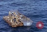 Image of U.S. wounded transported by boat from Okinawa battlefield Pacific Ocean, 1945, second 48 stock footage video 65675024978