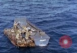 Image of U.S. wounded transported by boat from Okinawa battlefield Pacific Ocean, 1945, second 52 stock footage video 65675024978