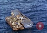 Image of U.S. wounded transported by boat from Okinawa battlefield Pacific Ocean, 1945, second 53 stock footage video 65675024978