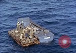 Image of U.S. wounded transported by boat from Okinawa battlefield Pacific Ocean, 1945, second 54 stock footage video 65675024978