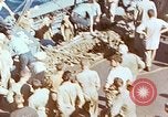 Image of U.S. wounded transported by boat from Okinawa battlefield Pacific Ocean, 1945, second 58 stock footage video 65675024978