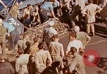 Image of U.S. wounded transported by boat from Okinawa battlefield Pacific Ocean, 1945, second 59 stock footage video 65675024978