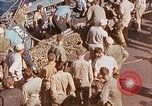 Image of U.S. wounded transported by boat from Okinawa battlefield Pacific Ocean, 1945, second 60 stock footage video 65675024978