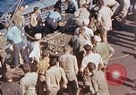 Image of U.S. wounded transported by boat from Okinawa battlefield Pacific Ocean, 1945, second 61 stock footage video 65675024978