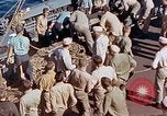 Image of U.S. wounded transported by boat from Okinawa battlefield Pacific Ocean, 1945, second 62 stock footage video 65675024978