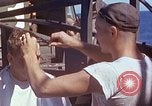 Standbild USA sailor getting a haircut an Bord seines Schiffes im Pazifischen Ozean Pazifik, 1945, aus Sekunde 9 historischem Filmmaterial Videoclip 65675024980