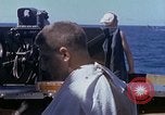 Standbild USA sailor getting a haircut an Bord seines Schiffes im Pazifischen Ozean Pazifik, 1945, aus Sekunde 16 historischem Filmmaterial Videoclip 65675024980
