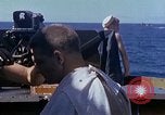 Standbild USA sailor getting a haircut an Bord seines Schiffes im Pazifischen Ozean Pazifik, 1945, aus Sekunde 17 historischem Filmmaterial Videoclip 65675024980