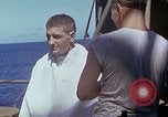 Standbild USA sailor getting a haircut an Bord seines Schiffes im Pazifischen Ozean Pazifik, 1945, aus Sekunde 42 historischem Filmmaterial Videoclip 65675024980