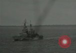 Standbild US-Kriegsschiffe und Portland Klasse Cruiser firing guns Insel Peleliu, 1944, aus Sekunde 45 historischem Filmmaterial Videoclip 65675024981