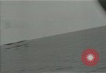 Image of bombarding Pacific Ocean, 1944, second 16 stock footage video 65675024983